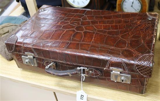 An early 20th century crocodile skin travelling vanity case width 51cm depth 29cm